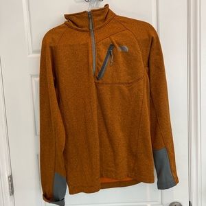 Men’s medium burnt orange quarter zip from The North Face
